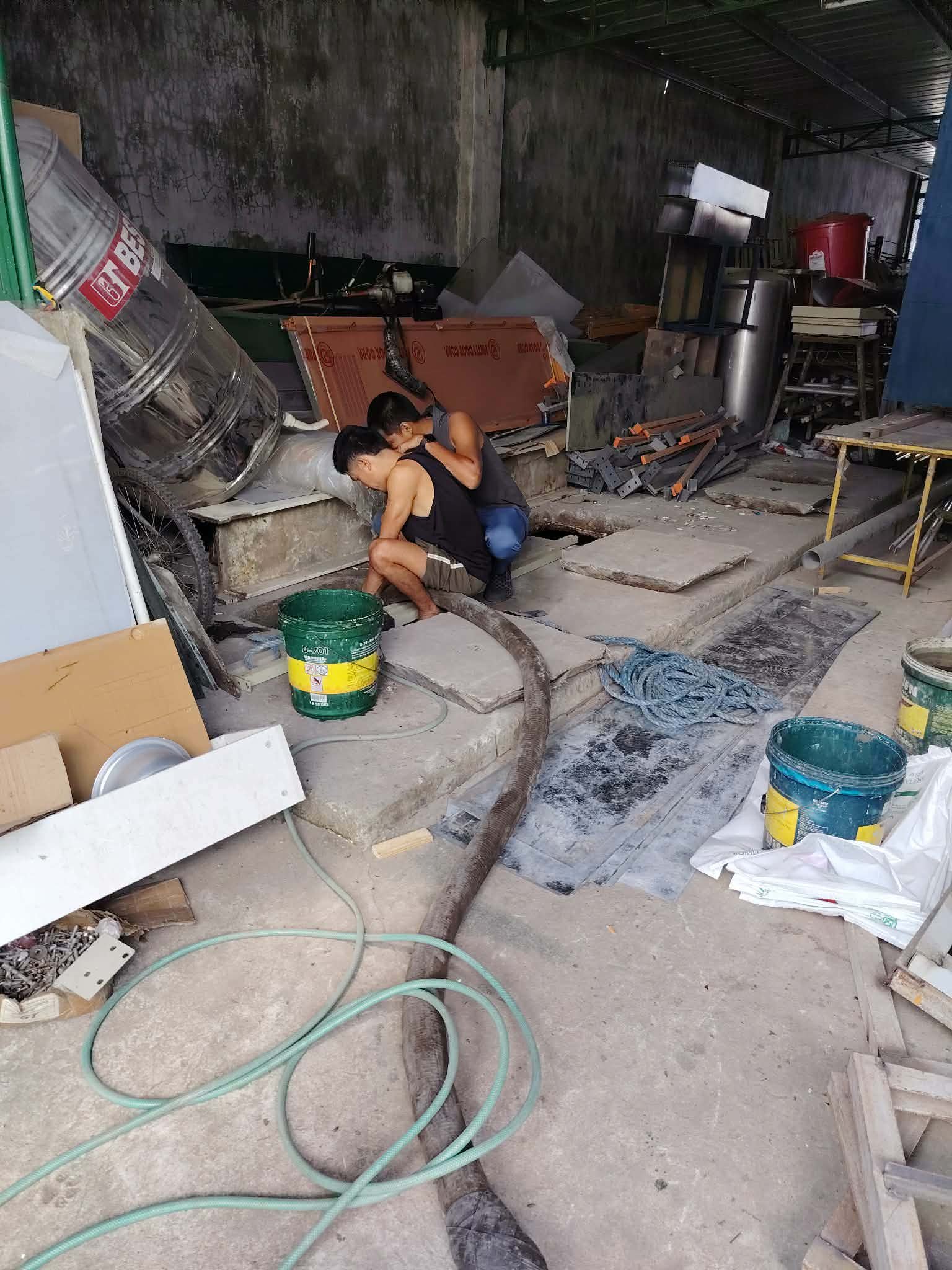 Malabanan team performing a plumbing job